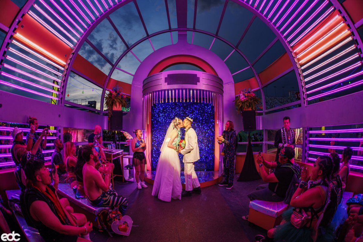 EDC_LasVegas's tweet photo. LOVE is always in the air when you're at EDC.💗✨🫶

Did you know that you can tie the knot in Downtown EDC at The Wedding Chapel of Technology or The Wedding Chapel of Nature?!🔎💒

More information at https://t.co/oqRi2VlG7l 💞 https://t.co/Y1yp2c2MYS