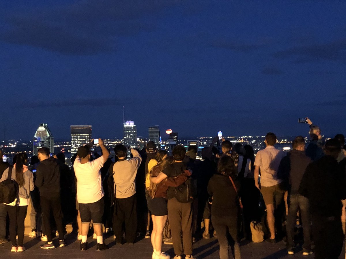 CL_opez's tweet photo. I last minute trekked up the mountain to check out the moon. What a crowd. Also, full moon or not, it’s still a great view of Montreal. #mtlsummer https://t.co/kfRkz1Ahh9