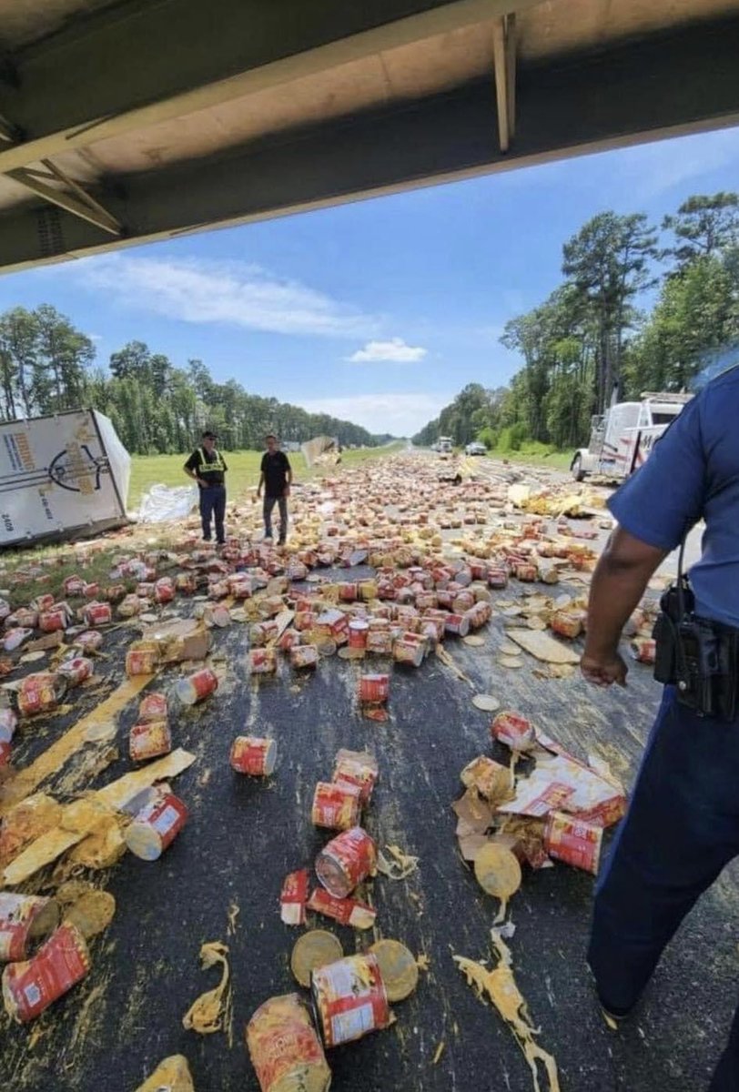myARDOT's tweet photo. Taco Tuesday, anyone? A truck carrying cans of nacho cheese spilled today on I-30 west near Prescott. 

Things are all clear now and traffic is moving. https://t.co/e6rKMXTk5Q