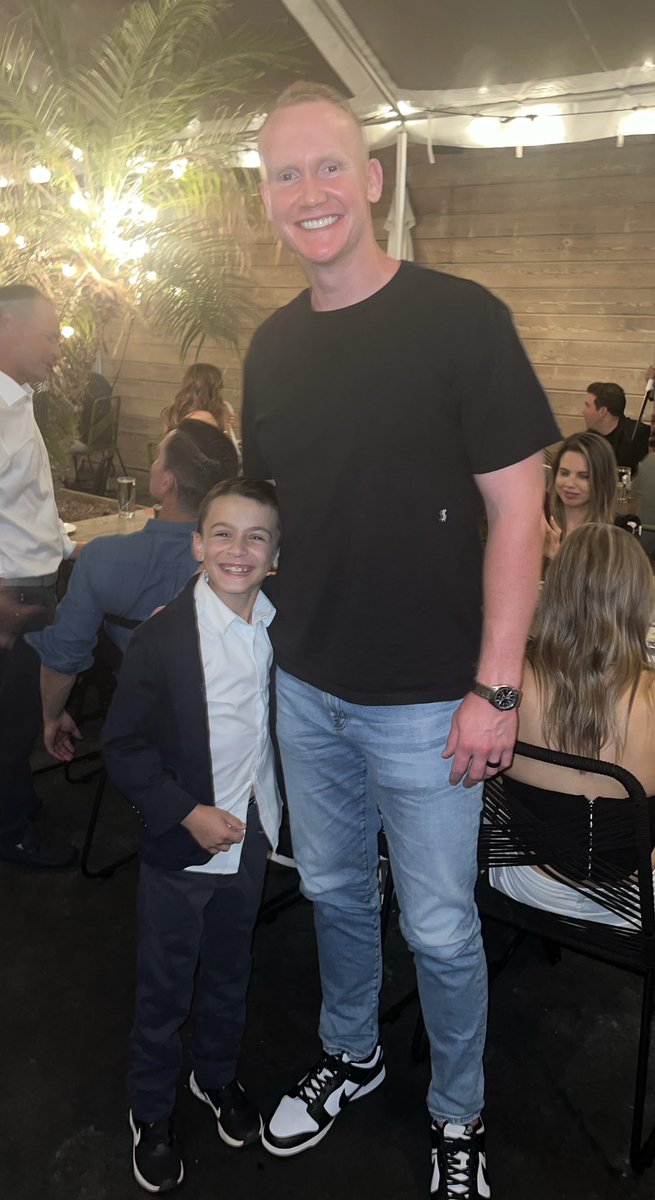 CraigMish's tweet photo. A gentle giant, with a heart of gold. Thank you @CoopaLoop1 for the incredible kindness and generosity you showed to everyone you came across. Including my Son. My best to you buddy. 🤙🏼 https://t.co/0vhXoyzezU