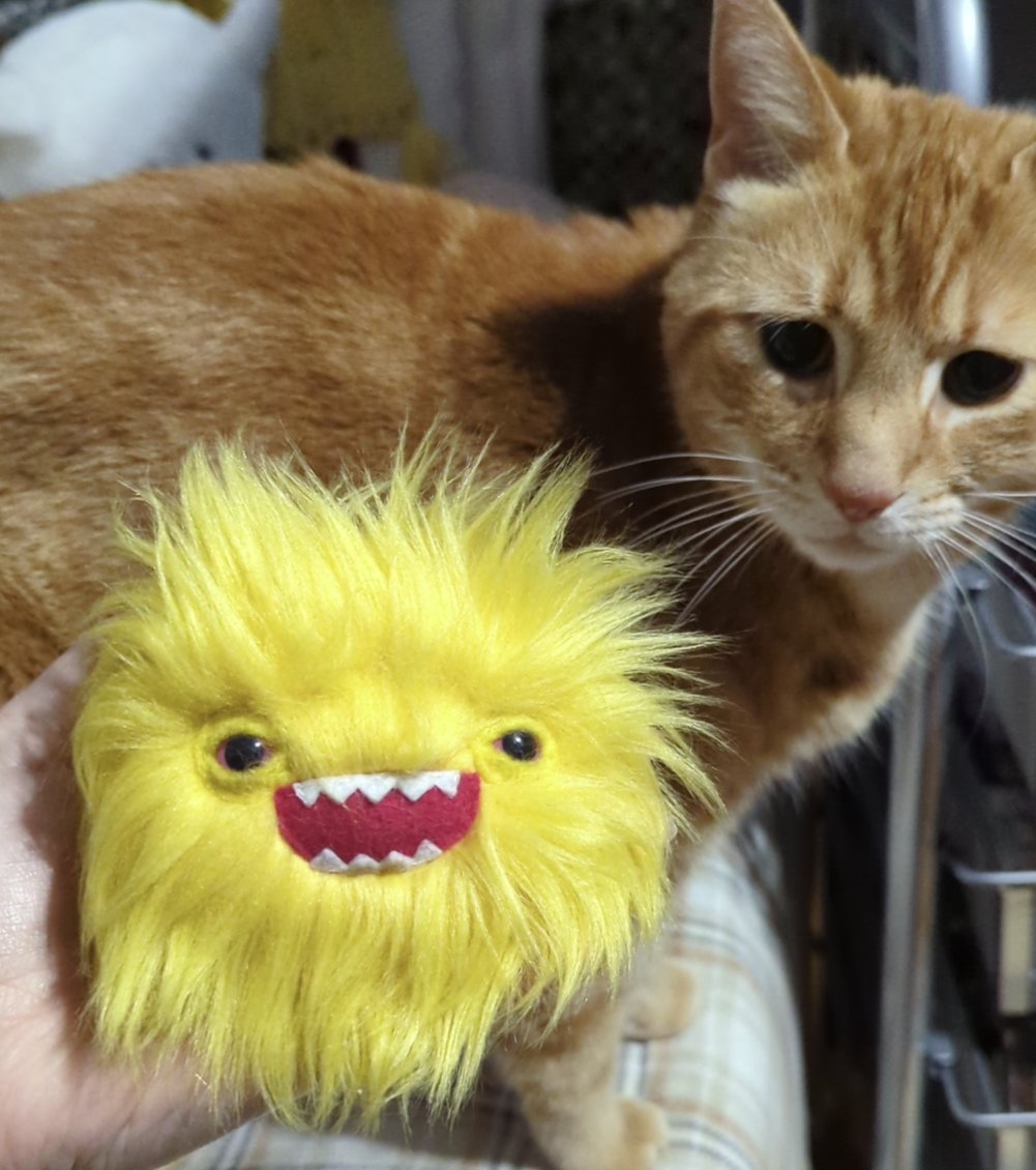 WitchPins's tweet photo. @loveandsandwich I HAVE. I still have one of your mini monsters! Photo quality is awful but I added my cat https://t.co/E0cJp2SMRn