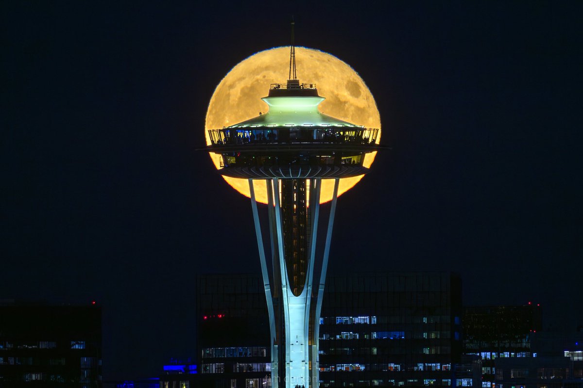 A perfect full moon rising over #Seattle tonight