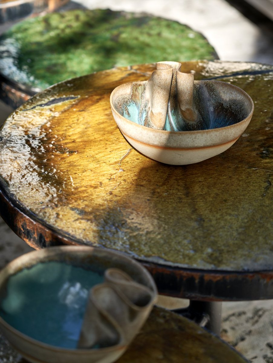 This colourful @Tighemiconcept coffee table is handmade in Morocco. The vivid glazed colours add a pop to an otherwise tranquil patio.