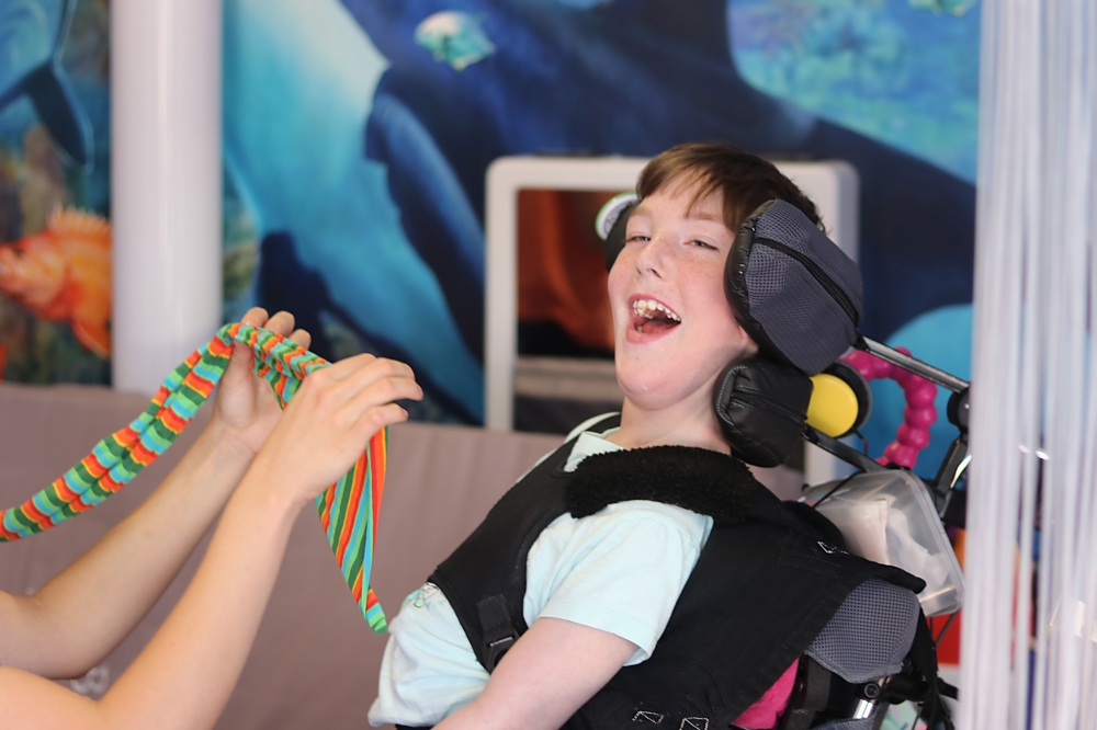 theRCOT's tweet photo. Meet Indy, she has Quadriplegic Cerebral Palsy and has a residential placement at @Childrens_Trust.

We've spoken to her Mum and occupational therapist Ella MacDonald about how play has improved 

#PlayDay https://t.co/dle3ZpH9Hv