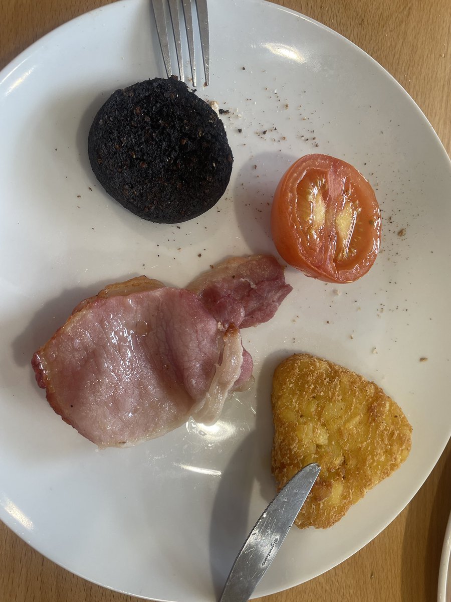 #morereasons not to eat at <a href="/Morrisons/">Morrisons</a> #cafe.
£0.99 for half a tomato, £0.99 for a solitary bacon rasher, £0.99 for a smidgen of black pudding £0.99 for one hash brown. Not your finest hour. Asked the staff about the tomato pricing: “yes mate, it’s a joke, I know.”