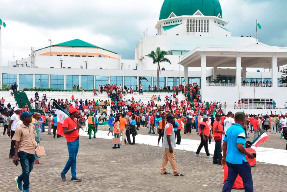 PLACNG's tweet photo. JUST IN: NLC protesters pull down @nassnigeria gate, force their way into complex
#TheNLC https://t.co/V3BI9TAwDg