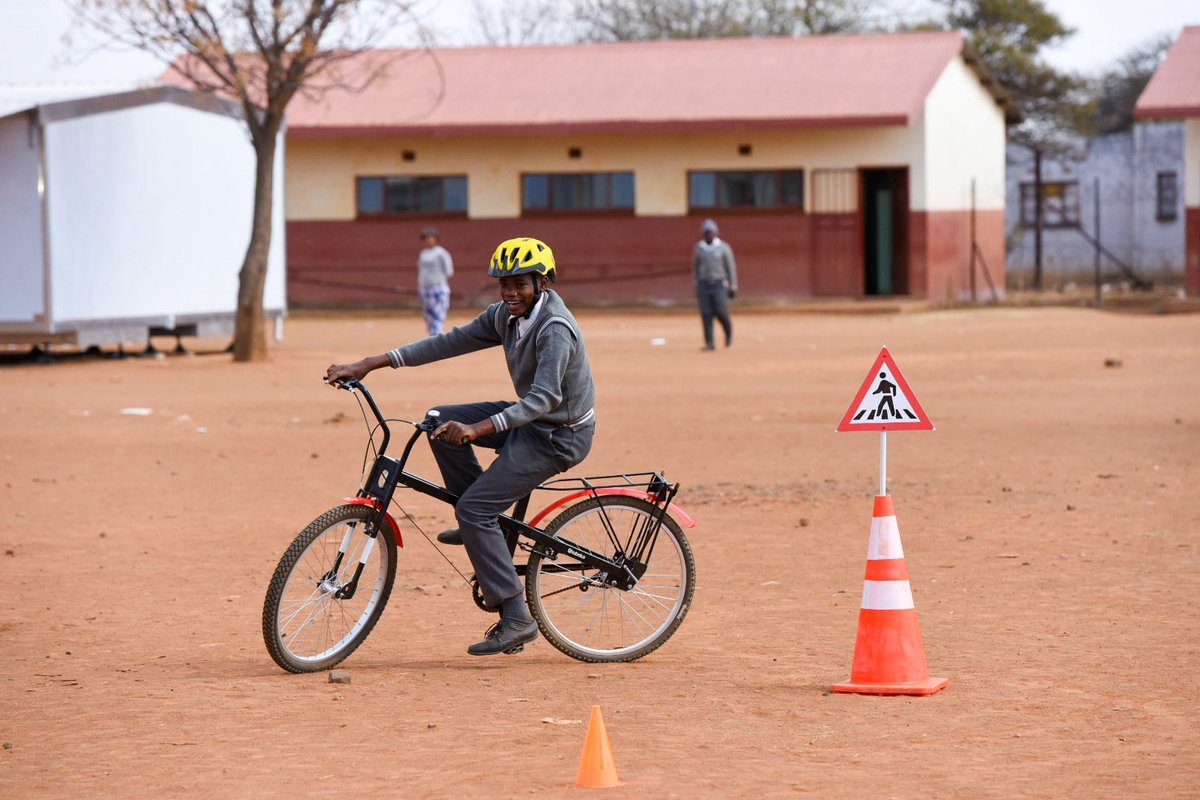 Qhubeka's tweet photo. Today more children are learning how to ride. Just in time for #NewBikeDay tomorrow.

Training involves an introduction to the bicycle, how to use the accessories and spare parts that they will receive, learning to ride as well as basic rules of the road.

#BicyclesChangeLives 🖐🏽 https://t.co/zkxe1P3ity