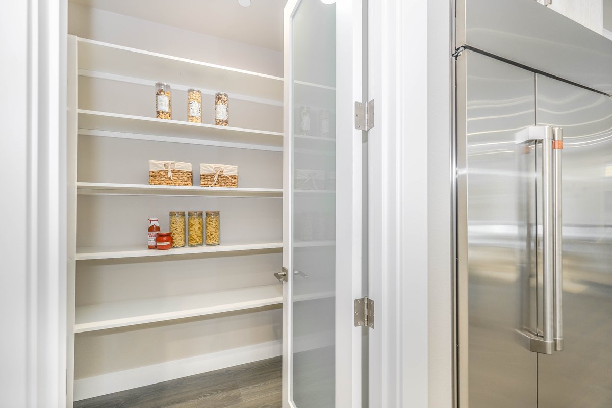 Back kitchens, the latest trend in new builds, are gaining popularity and becoming a top priority for homeowners. With hidden appliances cleverly tucked away in the pantry, these innovative kitchen designs offer both functionality and a sleek, clutter-free look.

#KitchenDesigns