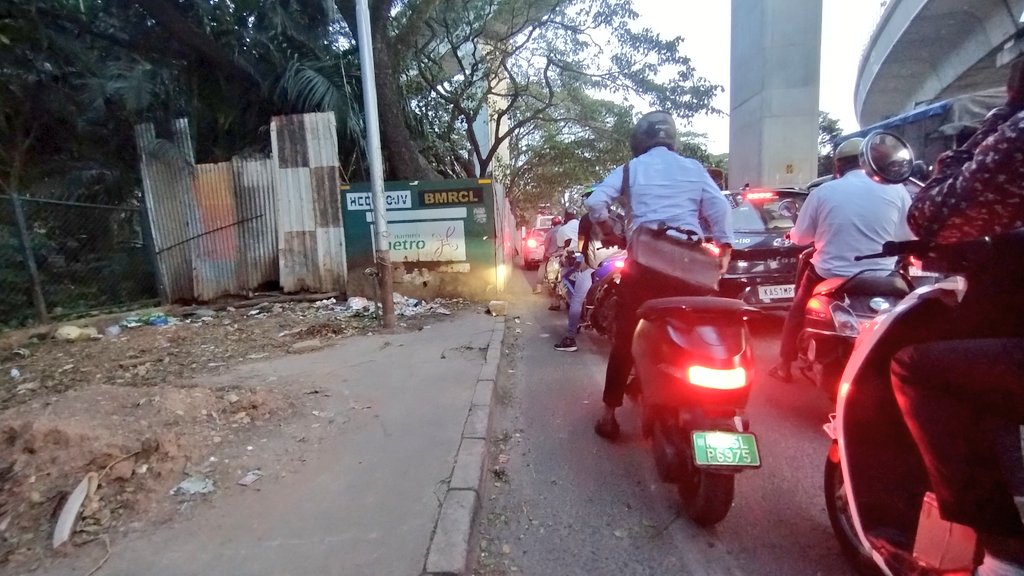 RBPachhapur's tweet photo. A whole of #foothpath near a traffic junction is taken over by @MDNammaMetro
Can we expect @blrcitytraffic @BlrCityPolice to act in favour of #Pedestrian #RoadSafety at
https://t.co/ZL8sWzvlSt
Can you ensure the safety of walkers?
#LetUsWalk
@jpnrwa @ICCCBengaluru
@namma_BTM https://t.co/3YHLgIKXzy