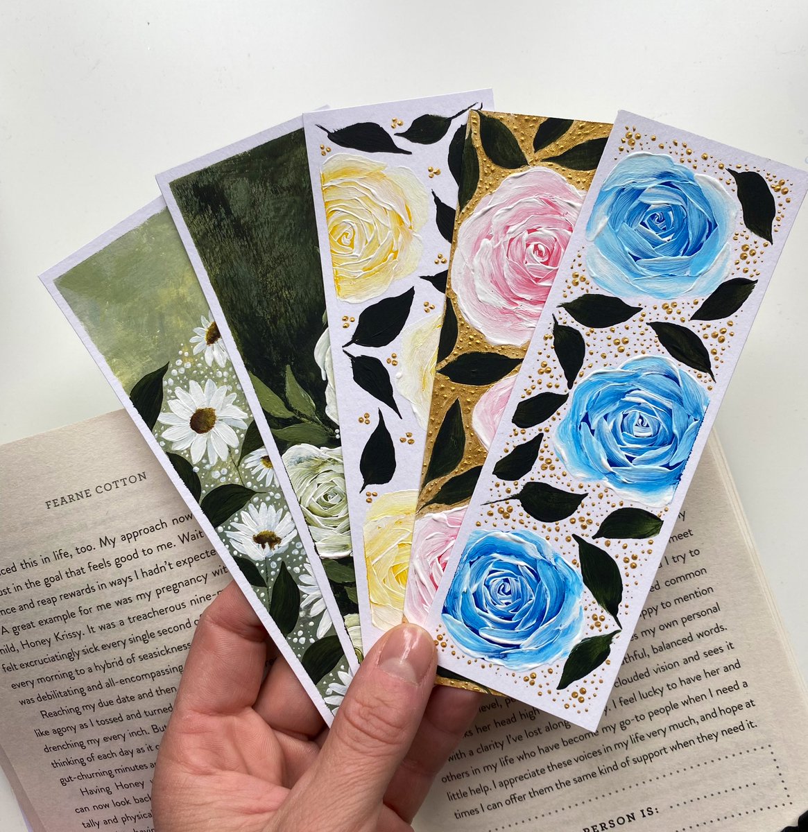 🌹📚 Love getting lost in the world of books? 🎨🌹Excited to share with you my new Bookmarks. Tap the link in bio to get yours now! 
#bookishgifts #handmadebookmark #bookwormsoftiktok #giftsforreaders #booknerdgift #booklovergift #handmadebookmarks #floralart