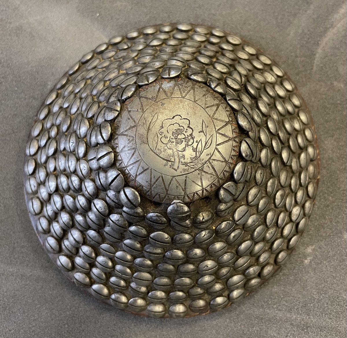 Cataloguing some Trophies of Arms in store ⁦⁦<a href="/Royal_Armouries/">Royal Armouries</a>⁩ ⁦<a href="/TowerOfLondon/">The Tower of London</a>⁩ today. This one, from the White Tower, is decorated with an arrangement of screws from firearms. I can’t believe that the screw heads are stamped with teeny, tiny Broad Arrows!