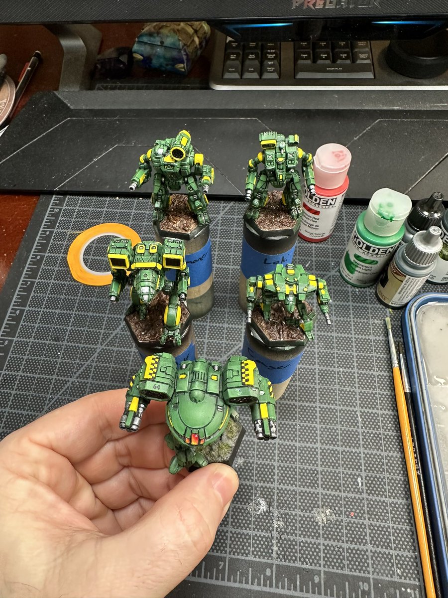 TBLHobbies's tweet photo. Going live on Twitch painting Clan Jade Falcon. All the highlights are in. Time to do the checkerboards, weapons and cockpits. Then we decal, varnish and base them. Using oils for the cockpits. #battletech #clanjadefalcon #commissionopen https://t.co/7dbSO8AHe8
