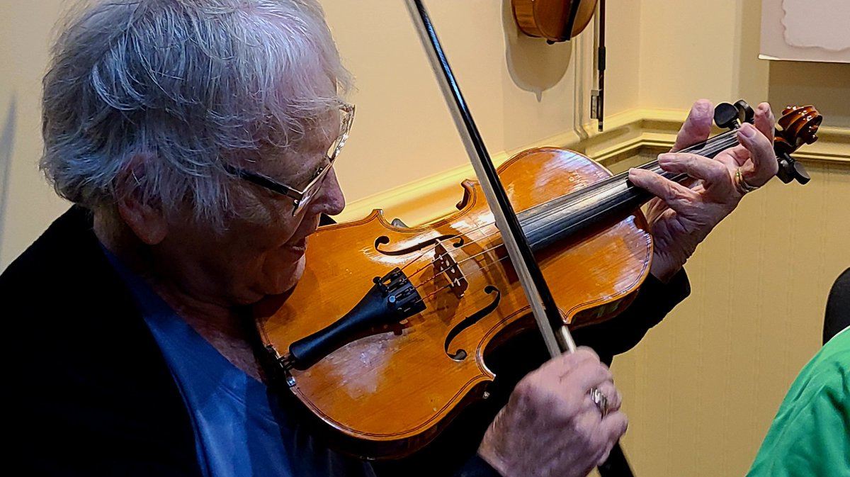 GreyCupBound's tweet photo. The crew cuttin' a rug learning to play fiddle at the #CelticMusicCentre in Judique, Nova Scotia. #VisitNovaScotia #ExploreCB #NeveratooOldToLearn https://t.co/4KiNFmrR0x