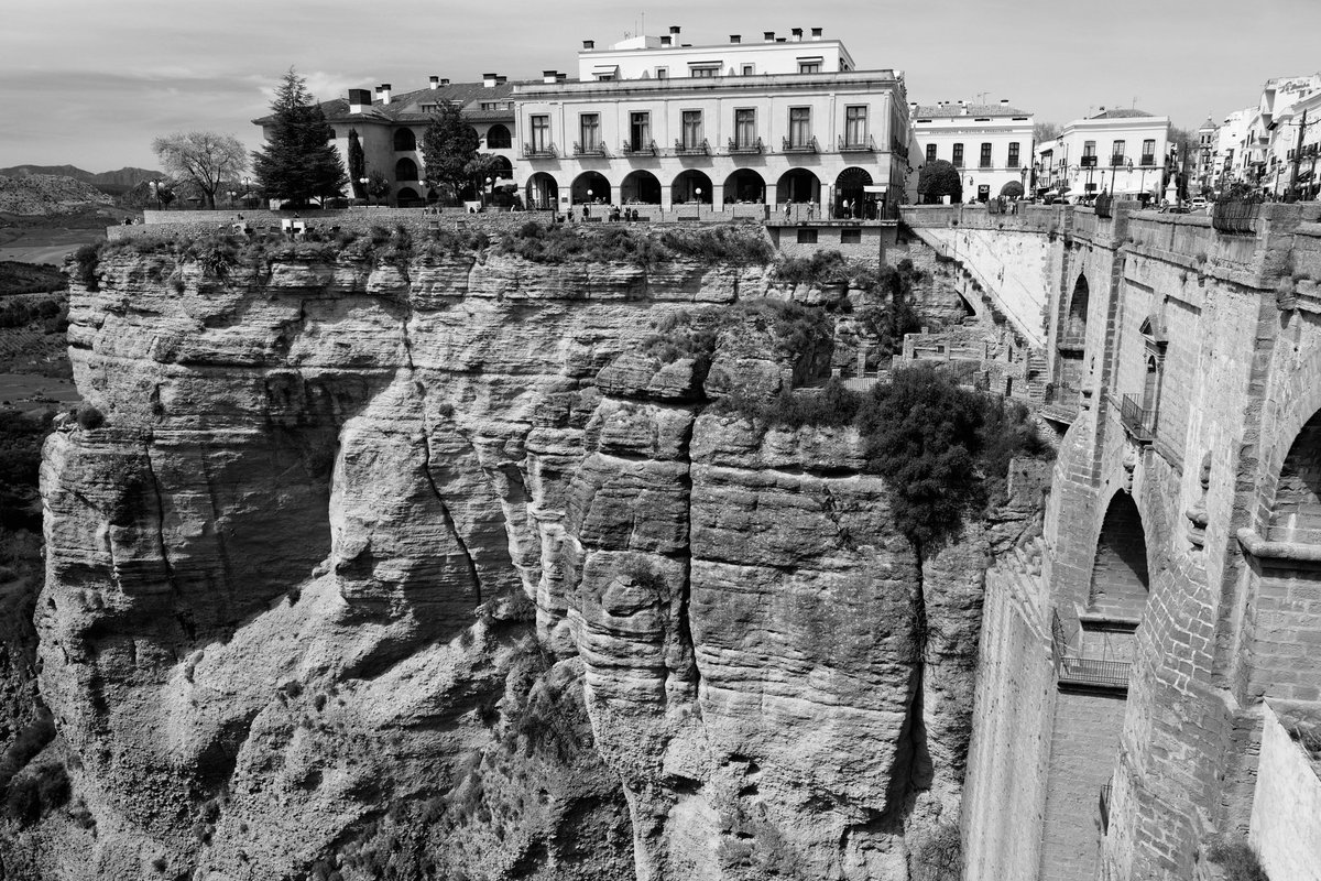 finbuchanan's tweet photo. After walking around the tops of these cliffs at Ronda, it was only when I looked from the other side of the gorge I realised how precarious it all looks with the huge cracks in the rock faces. 
#ronda #spain #spanishculture #leica #leicacamera #leicaphotography https://t.co/66uFsSf2SG