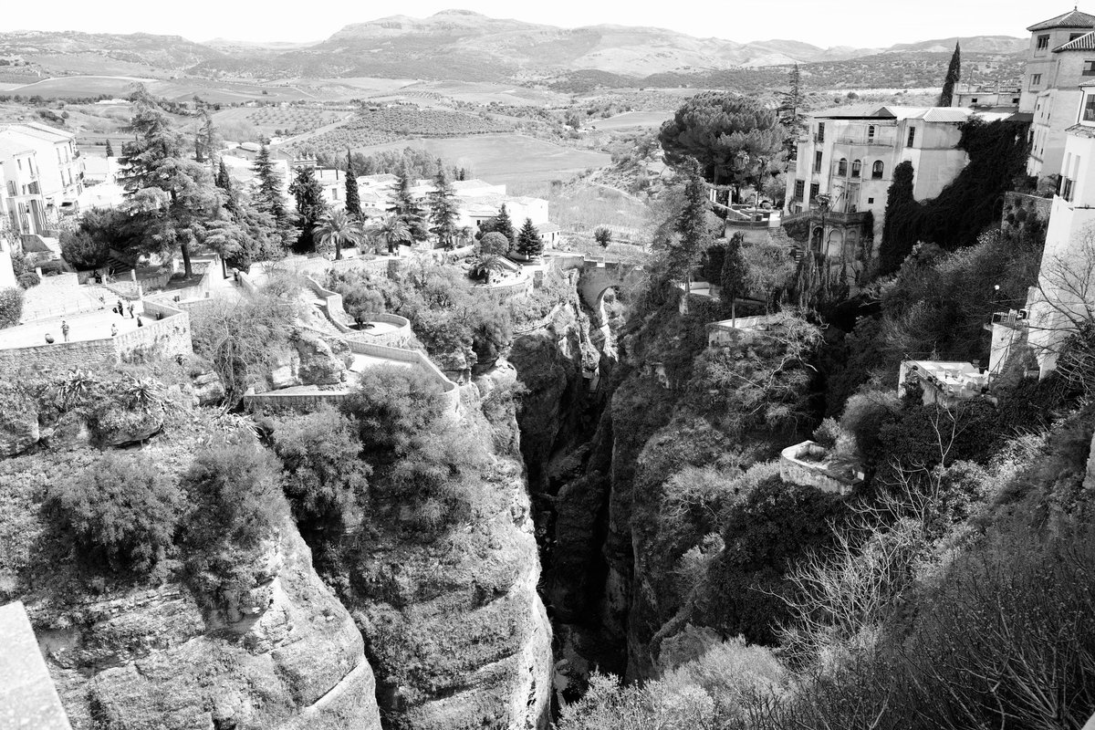 finbuchanan's tweet photo. After walking around the tops of these cliffs at Ronda, it was only when I looked from the other side of the gorge I realised how precarious it all looks with the huge cracks in the rock faces. 
#ronda #spain #spanishculture #leica #leicacamera #leicaphotography https://t.co/66uFsSf2SG