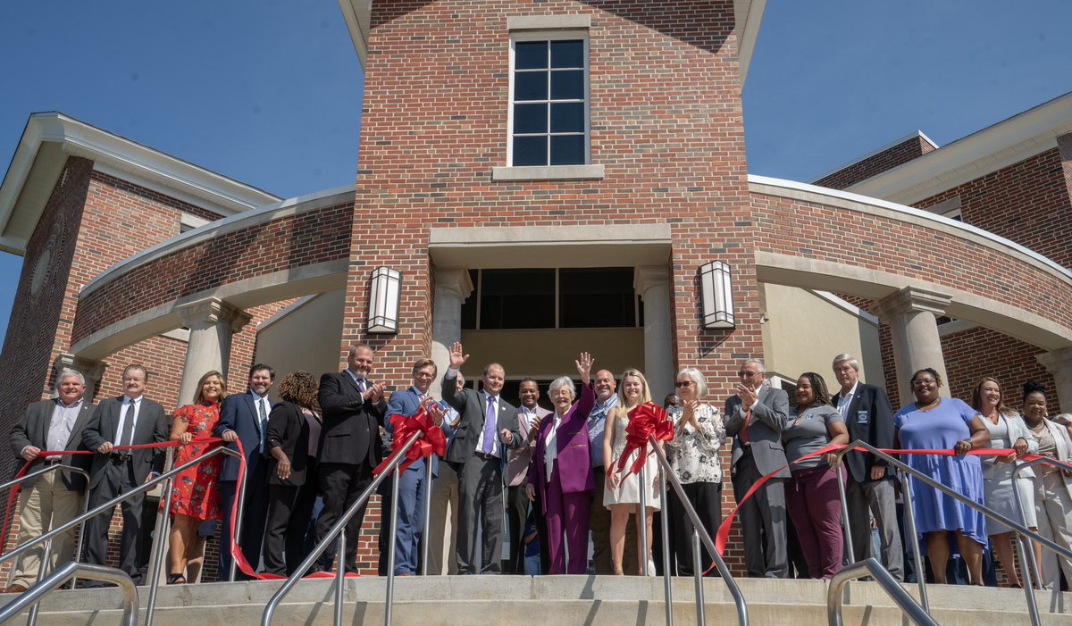 GovernorKayIvey's tweet photo. It was an exciting morning cutting the ribbon on the new Tallassee High School! In a week, students and educators will be walking these halls, and I can't imagine a better way to start the academic year. I am proud to put the state’s support behind this state-of-the-art facility. https://t.co/MqpWPMxTlO