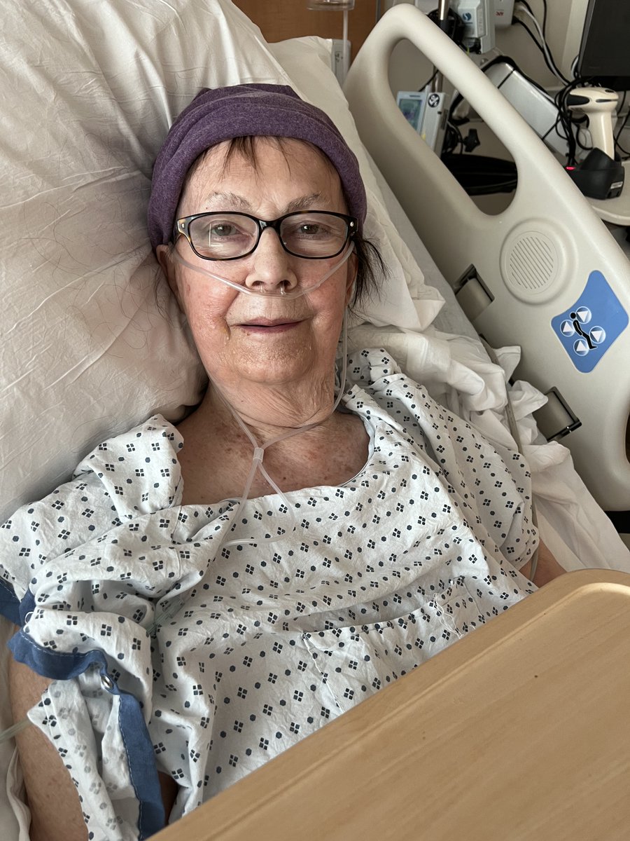 DrKnowItAll16's tweet photo. Hi, all, I owe all those who have sent so much love an update on my mom's situation. TLDR: she is doing MUCH better. She's still in the hospital, but improving daily and we hope to have her home in a few more days.
 
The details for those who might care. One week ago (last Wednesday) during a routine lung biopsy for her metastasized stage 4 ovarian cancer, an artery was nicked and she aspirated blood (basically she drowned). Her heart stopped, and she was on CPR for about 10 minutes before it started beating again. At this point the doctor talked to my sister about removing her from life support as he said she was comatose and unlikely to recover consciousness. About an hour later, however she opened her eyes and was responsive. I drove up to Springfield, VA, Thursday, to be with her and my dad (who needs full time care). 
Since then, mom has had a lot of ups and downs, but she got up and walked a bit today, has all her IV tubes out and has better energy today than any time in the last week. Still to go: she has a chest drainage tube that might come out today, or maybe tomorrow. She's still on 3L of O2 per hour. She has a lot of pain and swelling in her right arm from a small superficial clot. And of course she's very weak and tired. 
We have been working to get her a hospital bed, and to get 24 hour health care at home when she returns there to be back with my dad. They should have twin hospital beds together by tomorrow! 
She is obviously behind in chemo treatments now, and will have to have a hard discussion with her oncologist about whether to continue with that course now, or let things take their natural path. 
At this point I plan to drive back to Athens tomorrow, but of course that could change if things change here. 
Again thank you to everyone who has been so concerned and so thoughtful and loving to her in this difficult time. I, and she (I showed her many of your responses) have been overwhelmed by your good thoughts and prayers.