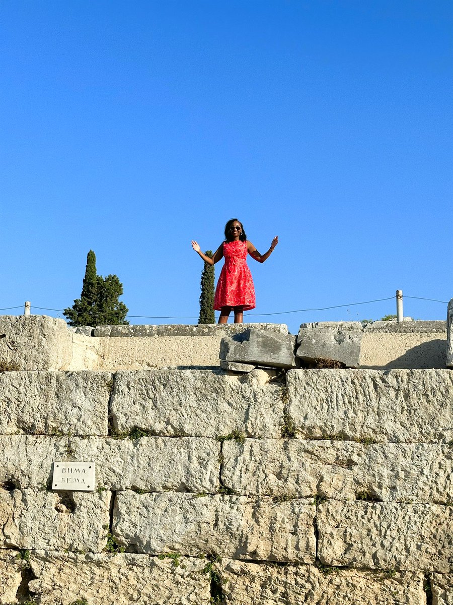 paulinenjoroge's tweet photo. Where I am standing on the 1st and 3rd photo is exactly where Apostle Paul stood and preached to the Corinthians. 

Corinth was one of the most important Greek City States; it was a wealthy and a thriving city. If there was a comparison to a present day city, that would be Las Vegas. The city had two sea ports; on the Corinthian sea and the Argosaronic sea, making it an important and powerful trading destination. People from all over the Mediterranean world converged in Corinth. 

With the kind of money in circulation, Corinth was the sin city of the ancient times. People were engaged in all manner of indulgencies, gambling, sex etc, and were more stubborn than Nairobians 😅. The religious background of Corinth was a mix of Greek, Roman, and Oriental. The teachings of Christianity which was a new religion went against the grain of everything these people knew of a belief system. 

The church in Corinth also had various struggles such as divisions, false teachings and immorality. It was for this reason that Apostle Paul wrote them two letters in order to strengthen the converts who struggled with reverting to their past belief, and to help them with their questions and problems. 

The apostle spent a year and a half in Corinth and many people believed in Jesus because of his preaching. Amidst many challenges Paul a Roman citizen also preached in other parts of Greece. He was the apostle called to the gentiles, and he faithfully carried out this mission until his death. It is believed he was beheaded in Rome.

If Paul was writing to Kenyans today, how do you think he would address us?

#HistoryTimeWithPauline