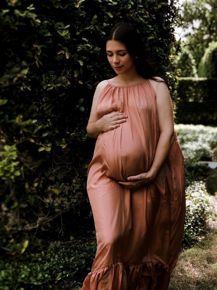 the_pastaqueen's tweet photo. This is probably my favorite picture ever taken of me. I was pregnant with Penelope, my fourth child. I loved it so much that I wanted to capture the essence of it so I commissioned a painting. https://t.co/yWMFNdFSKJ