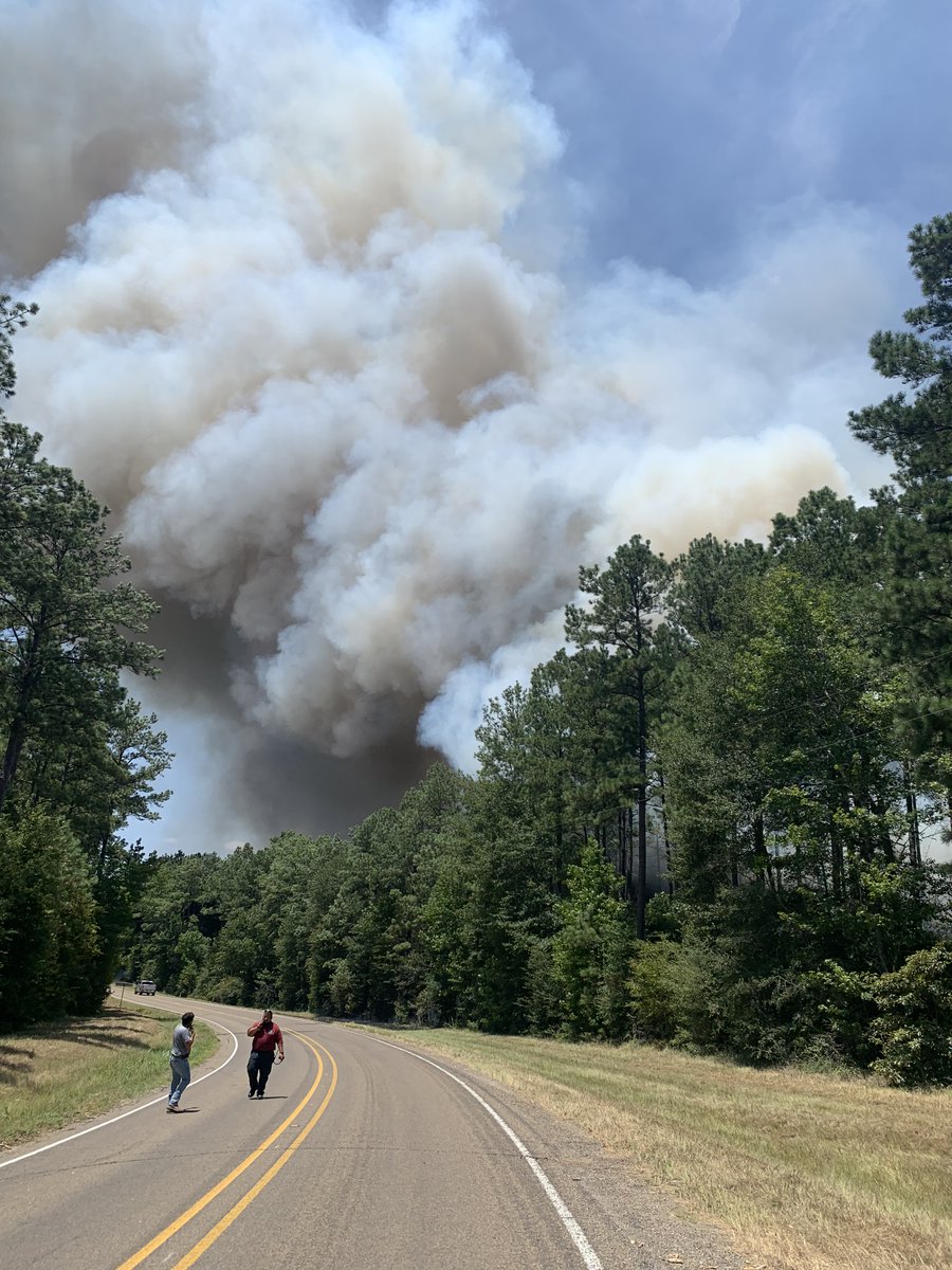 AllHazardsTFS's tweet photo. Update: the #SanJacinto2715Fire in San Jacinto County will now be named the #SnowhillFire. The fire is an estimated 150 acres and 50% contained. Aircraft continue to make beneficial drops to slow fire spread and assist ground crews. #txfire https://t.co/w2wGYca2Wd