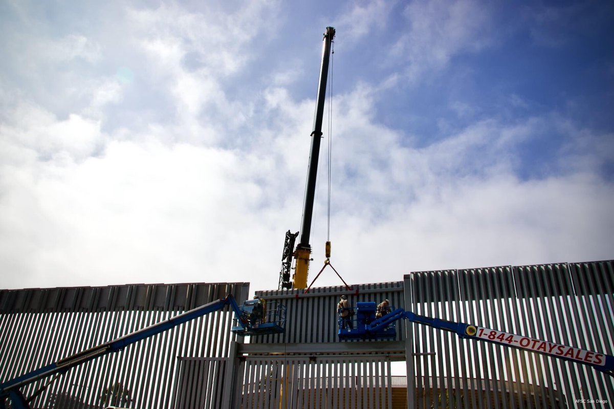 AFSCSanDiego's tweet photo. At Friendship Park, DHS places final touches on @potus 30ft border wall, deadly to people who attempt to climb it &amp; devastating to local environment. Construction crews will build a 30ft primary border wall, which will be taller than what already presently divides the US &amp; MX https://t.co/3LutZOdZpM