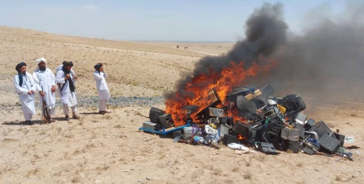 TheMessenger's tweet photo. Taliban Sets Pile of Instruments Ablaze, Says Music Causes ‘Moral Corruption’ https://t.co/ioRpxUygXv https://t.co/dJvpXybJ09