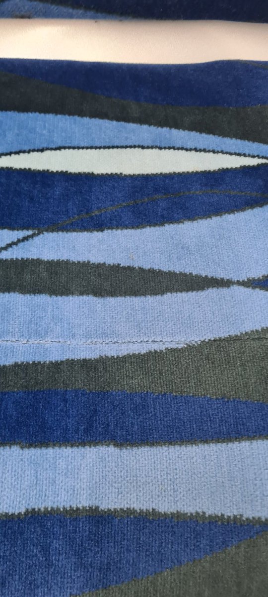DanielleJStorey's tweet photo. Hey @metrotrains I took a photo of your seat and asked @midjourney to describe the pattern and then promoted it to design a butterfly from that description. #aiart #describe #nofilter #butterfly https://t.co/W6ajWj8oVm
