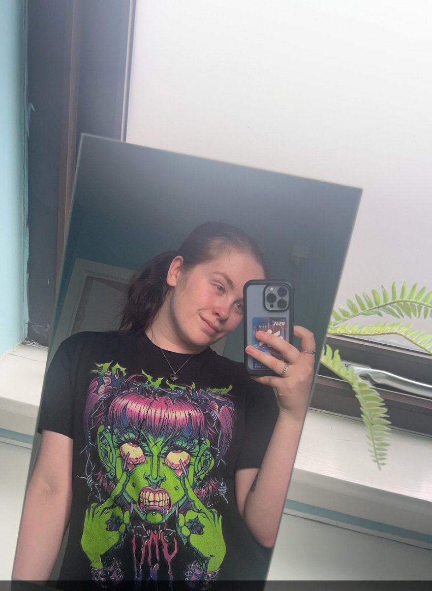 Meganleo17's tweet photo. @Syndicate I’m personally a baggy tshirt kinda gal. I bounce between super lightweight girly T-shirts to stuff like this tho 🤣 I’m very much a comfort over style person but I love a cool design on a tshirt. https://t.co/T7RSTsqCSF