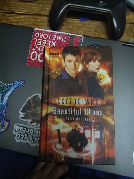 Caroniver413's tweet image. Beautiful Chaos: Gary Russell
(as of initial writing June 2022)
I read it a while back, so some details have slipped my mind, but it was a pretty nice book. I liked Donna's characterization, and Wilf's always great. Wilf's friend Netty was, of course, absolutely heartbreaking.