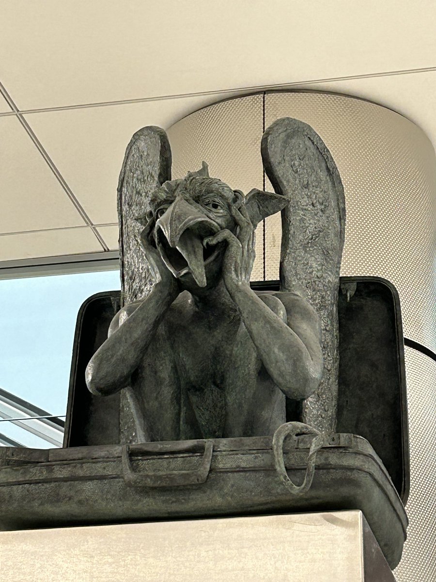 kellymatthews00's tweet photo. @DENAirport please elaborate on this statue outside of baggage carousel 16.  LOL!  😂😳👹 https://t.co/MyuTaFCmZN