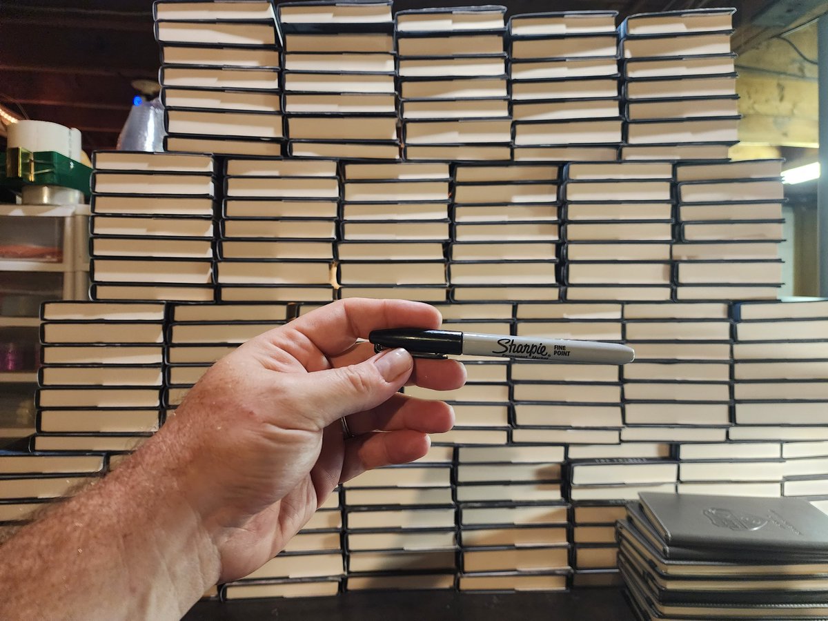 PhilbrookAuthor's tweet photo. Hey @Sharpie : I was able to sign all these hardcovers tonight, plus another 150 using the SAME FINE POINT MARKER. Plus the addresses on the boxes, plus bookmarks.

One marker did all the work. 

Y'all make a quality product. I'm bronzing this thing after I sign the rest. https://t.co/NLrb1SnQ6P