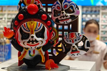 StoryOfBeijing's tweet photo. The official licensed merchandise store for the #Chengdu #FISU #WorldUniversityGames has been overwhelmed with visitors since it opened on Saturday. https://t.co/qXQgBEIBtE https://t.co/CeAyIJs6VI