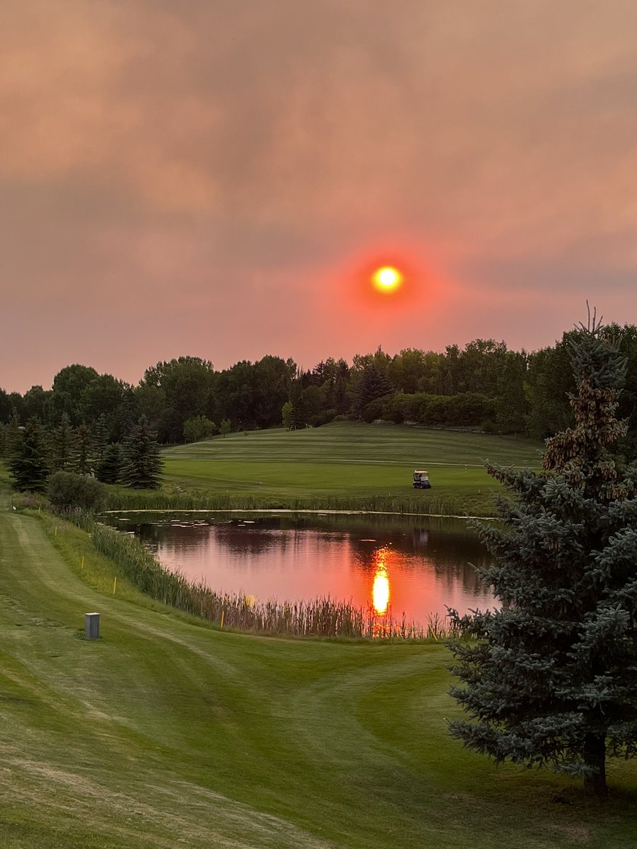 The smoke adds drama over the @LynxRidgeGC tonight.