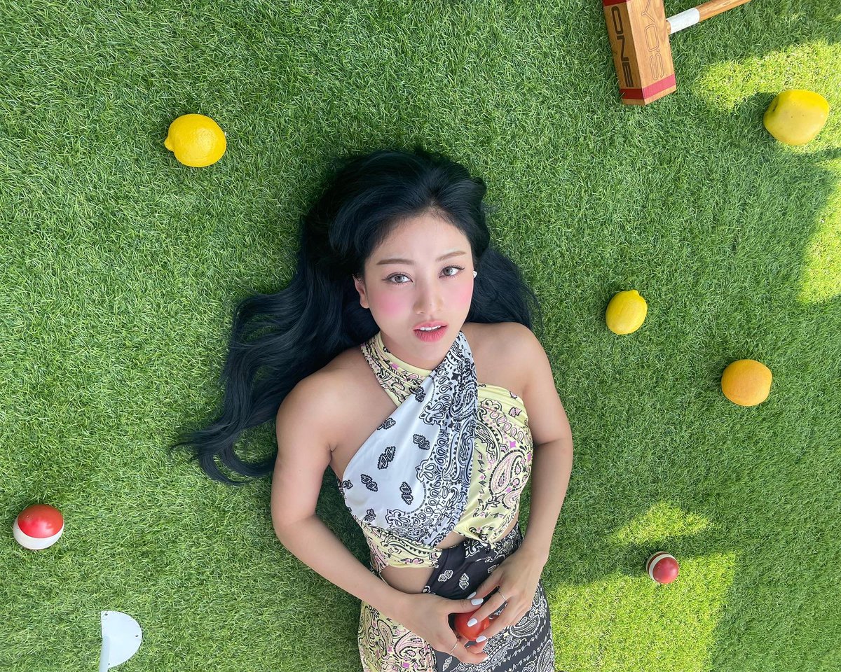 Jihylo's tweet photo. In the warm embrace of summer, the girl relishes the sun's gentle caress, adorned in a beautiful flowing dress that dances with the breeze. Lays upon the soft, verdant grass, a tranquil smile graces my face, and my eyes sparkle with delight. https://t.co/KjCrrftJL9