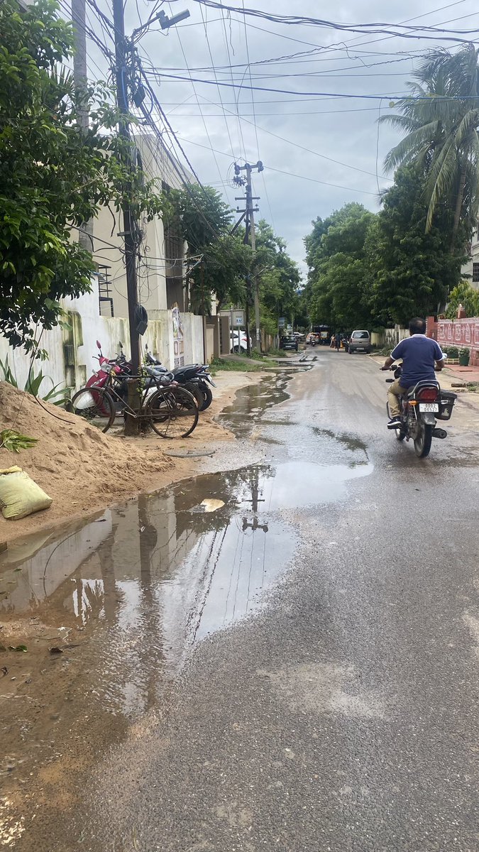 Dev_shukla's tweet photo. @bmcbbsr stinky roads because of leaking drainage, this is what happens every time there’s heavy rain. And then comes #dengue, #malaria and what not. We need a permanent solution to this. Can you give us one. This is road 2 in N2, IRC village, BBSR. https://t.co/7jCvoMEDni