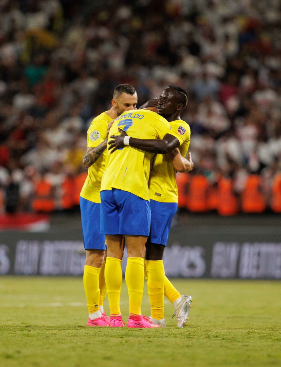Mané and Cristiano Ronaldo celebrating. 🫂