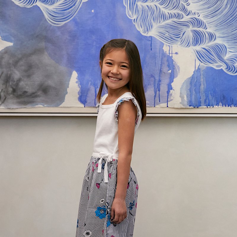 #Smile  😄Miss M looking radiant in our Vanessa cotton #dress  in white 💗#Love the ruffle sleeves + ribbon ties! Plus the striped floral pattern is just 😍 edenandzoe.com/collections/gi… #fashion #kidswear