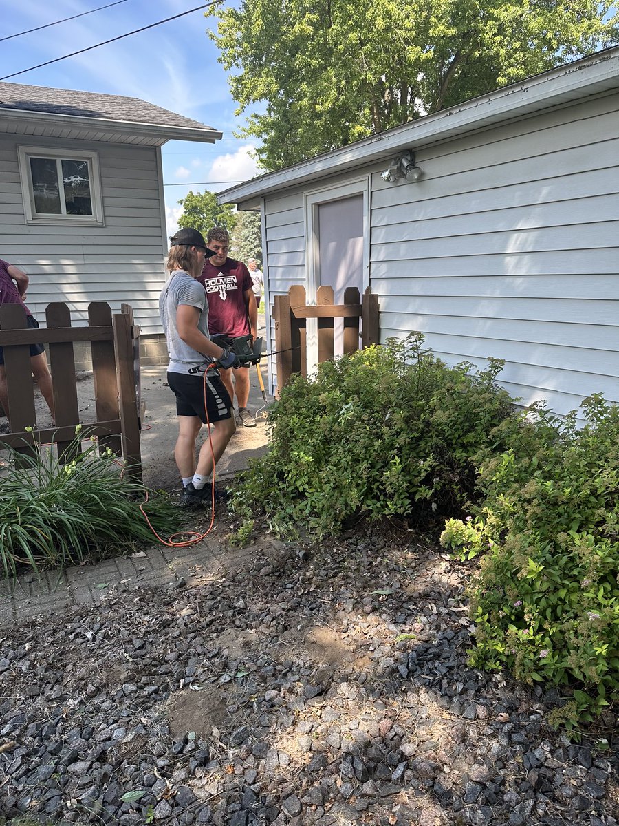 What do Holmen Football players do between practices? How about yard work for a 80 year old senior citizen!! #chopwoodcarrywater