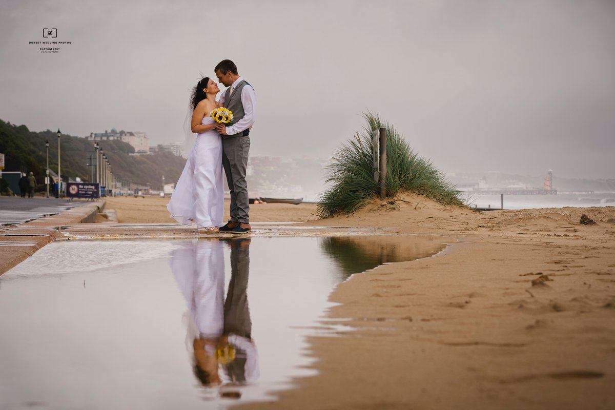 PhotosDorset: The amazing Viki and James in Bournemouth yesterday at Branksome Dene Chine, they didn't let the weather spoil their day! #Bournemouthwedding 🥰😍👰🏻‍♀️🌨️☔️🤵🏻