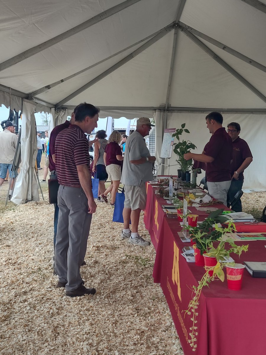 BevDurgan's tweet photo. Great Day 2 at the MN FarmFest!  Thank you Interim UM President Jeff Ettinger and Governor Walz for stopping by the UM Tent.  @UMNExt https://t.co/acgpGZNmDA