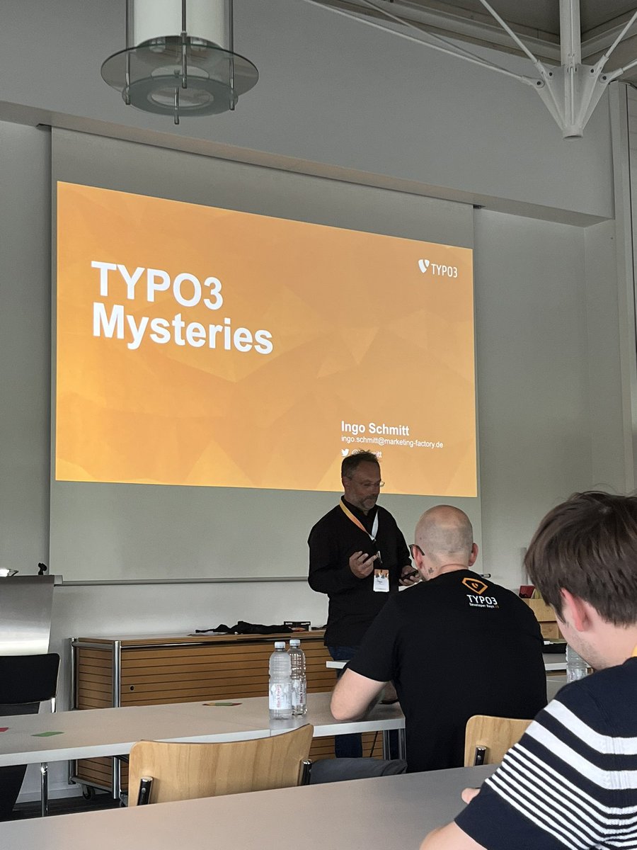 Ending Day 1 with "TYPO3 Mysteries" by <a href="/ISchmitt/">Ingo Schmitt - See my on other social media sites</a> 🥸🧡 #t3dd