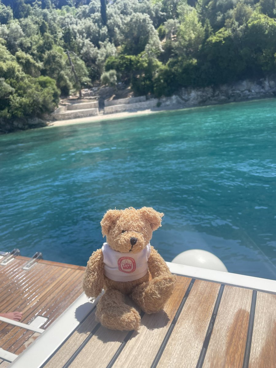 ElloughtonPS's tweet photo. Elloughton Bear has moved on from the land and is now enjoying the wind running through his fur on the Ionian Sea! He enjoyed olives and feta cheese for lunch. Where in the world is he? #whereintheworld #Elloughtonbear #summerchallenge https://t.co/u5tJsLicqd