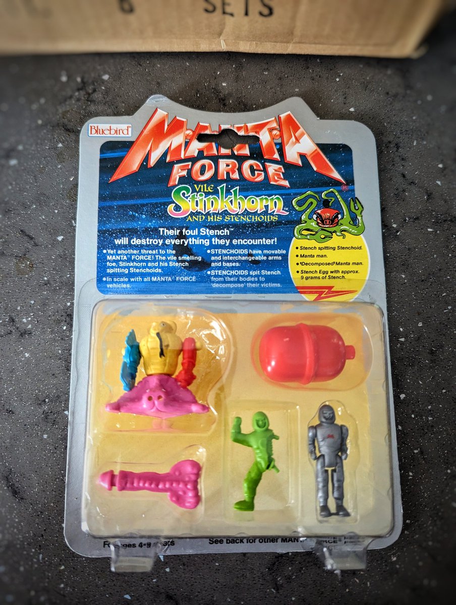 That's right! It's a mint, sealed Manta Force Stinkhorn set! The vile Stinkhorn and his Stenchoids were the last faction to be added to Manta Force and their 'Stink Eggs' were amazingly pungent! I'm very pleased to add this to the collec...wait. What the...