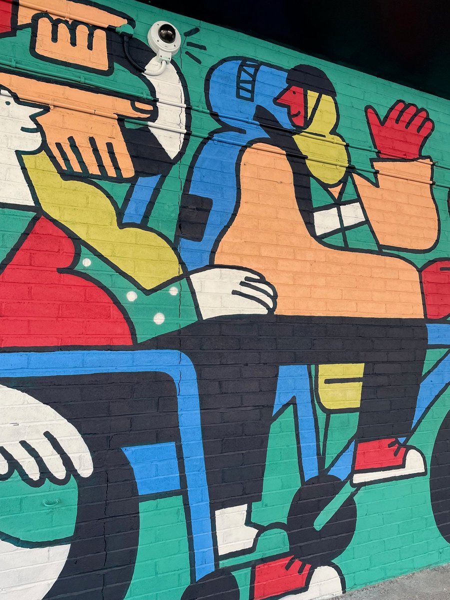 Take a look at our latest mural! This cheerful bespoke artwork has been created by local illustrator David J. McMillan 🖌️

Working with the @ArtsUHBW team, David's bold and cheerful characters have transformed the once drab and grey wall.

#CycleToWorkDay #HospitalArts
