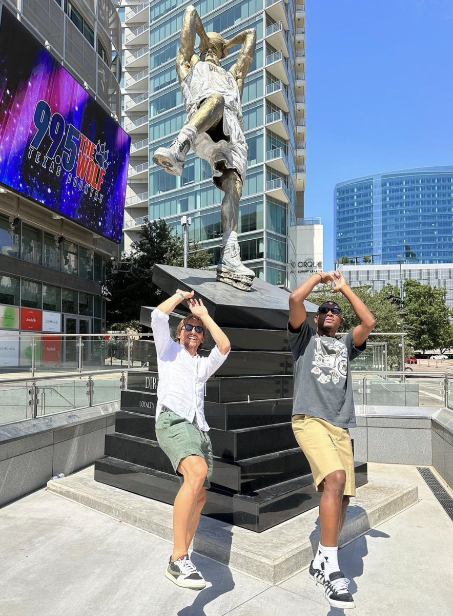 Mavs_FFL's tweet photo. Luka Modrić &amp; David Alaba stopped by the Dirk statue 🐐⚽️

#MFFL https://t.co/lwjMQGaE7j