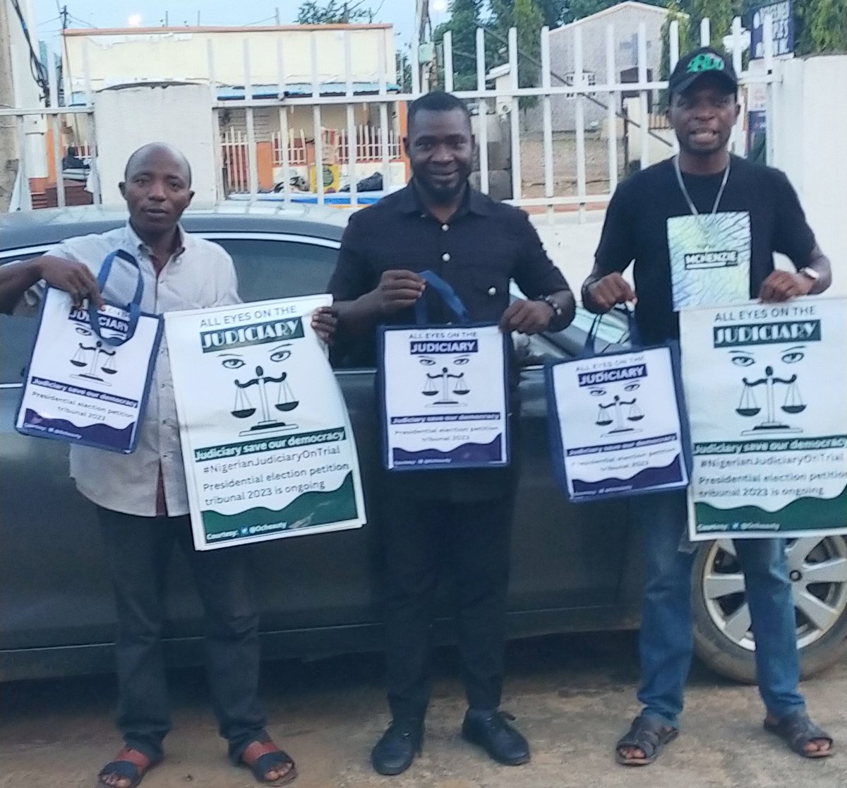 Today at wuse market, to distribute materials, like phone stickers, car stickers, posters and bags to market men and women in FCT, telling them that it's not over yet, the end to their suffering is coming, a new Nigeria is PO-ssible. COURTESY@Ocheauty ALL EYES ON THE JUDICIARY.