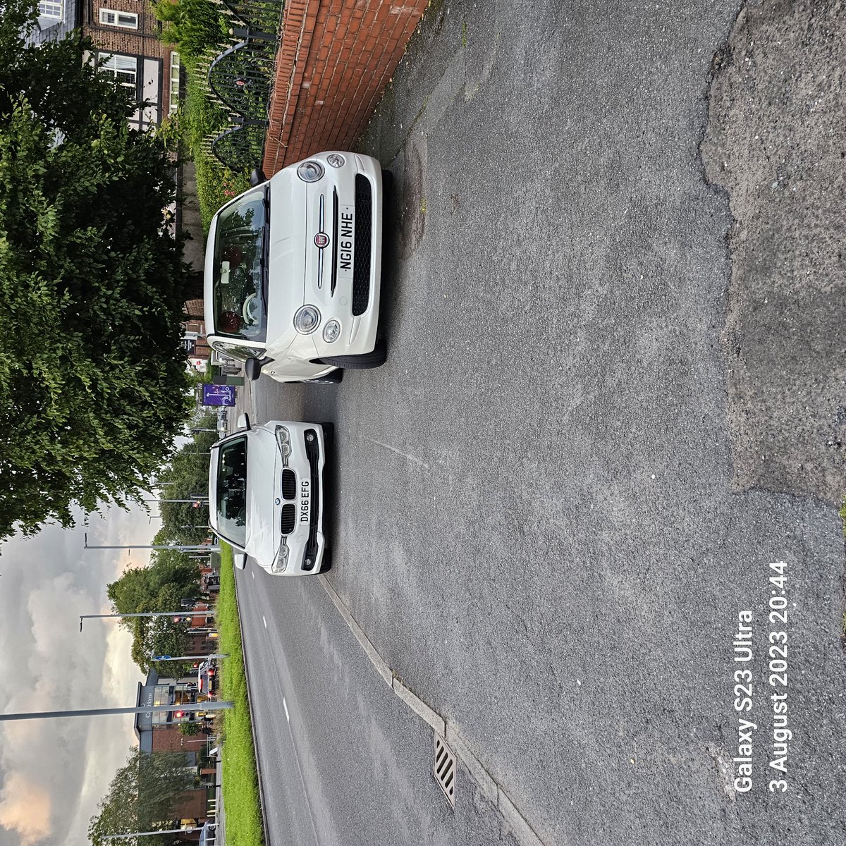 <a href="/ManCityCouncil/">Manchester City Council</a> 
Why am I squeezing past 2 cars taking up a double footpath as a pedestrian?