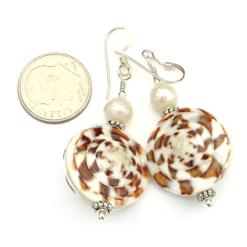 New! One of a kind captain cone #seashell #earrings w/ faceted #pearls! bit.ly/TheOceanCallsSD via @ShadowDogDesign #ShopSmall #Beach #BeachEarrings #ShellEarrings