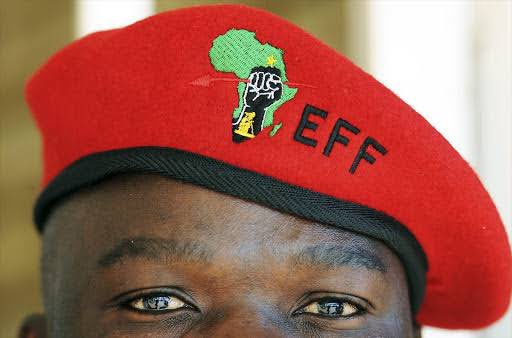 Julius_S_Malema's tweet photo. The Red Beret is a revolutionary symbol of defiance and resistance against the status qou. Only those who don't seek validation from the establishment and are prepared to pay the highest price will wear it with pride, ready to be ostracized. 

Our struggle against neo-colonialism with its imperialist forces is real and will never surrender. Not now, not ever! We will overcome.