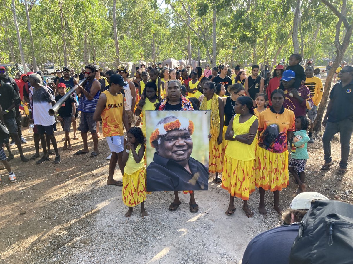 The Garma festival begins on North east Arnhemland with a memorial service for the late festival founder and Gumatj clan leader. Led by his family.